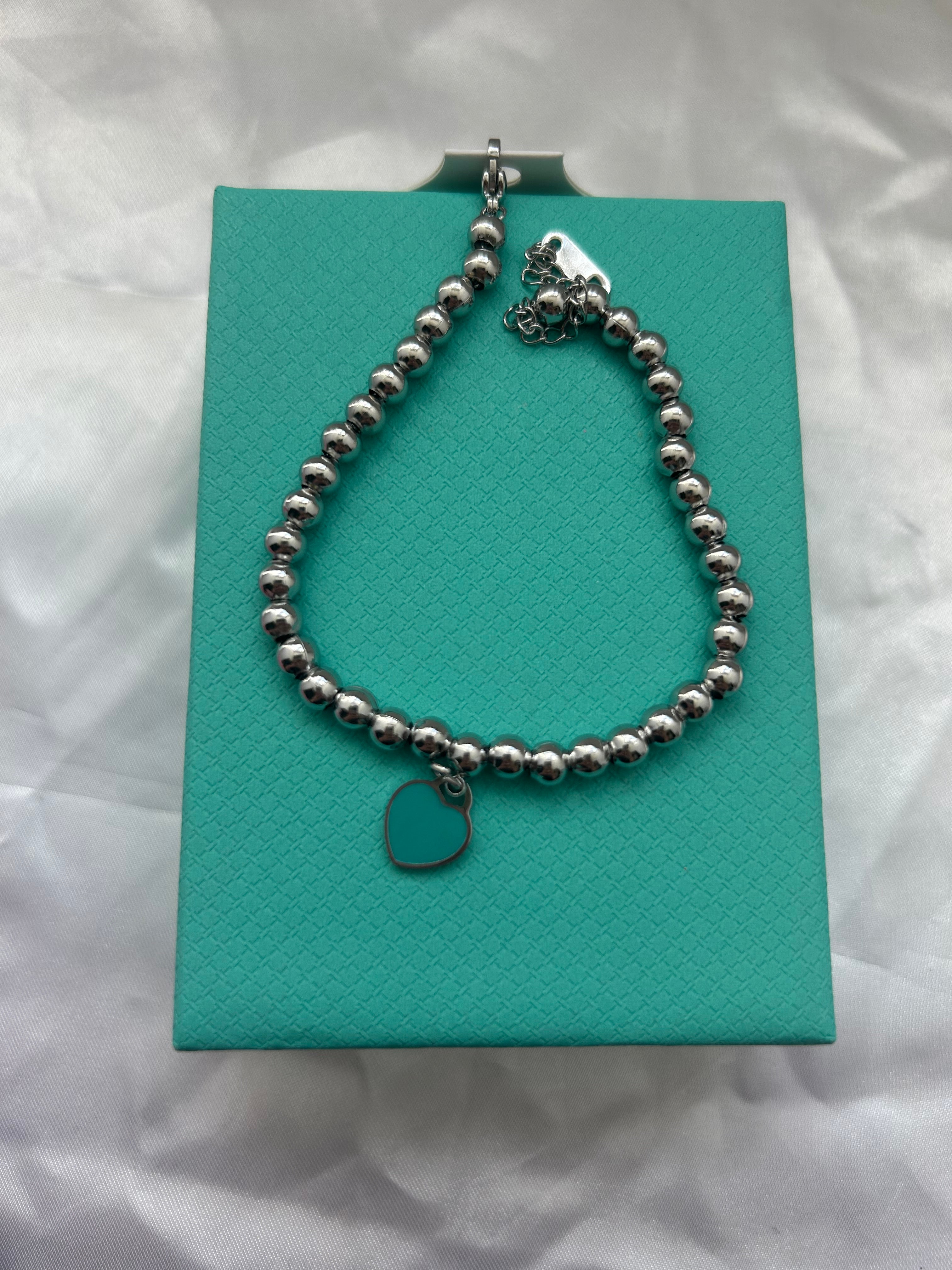 T New York Silver & Blue Heart Bracelet