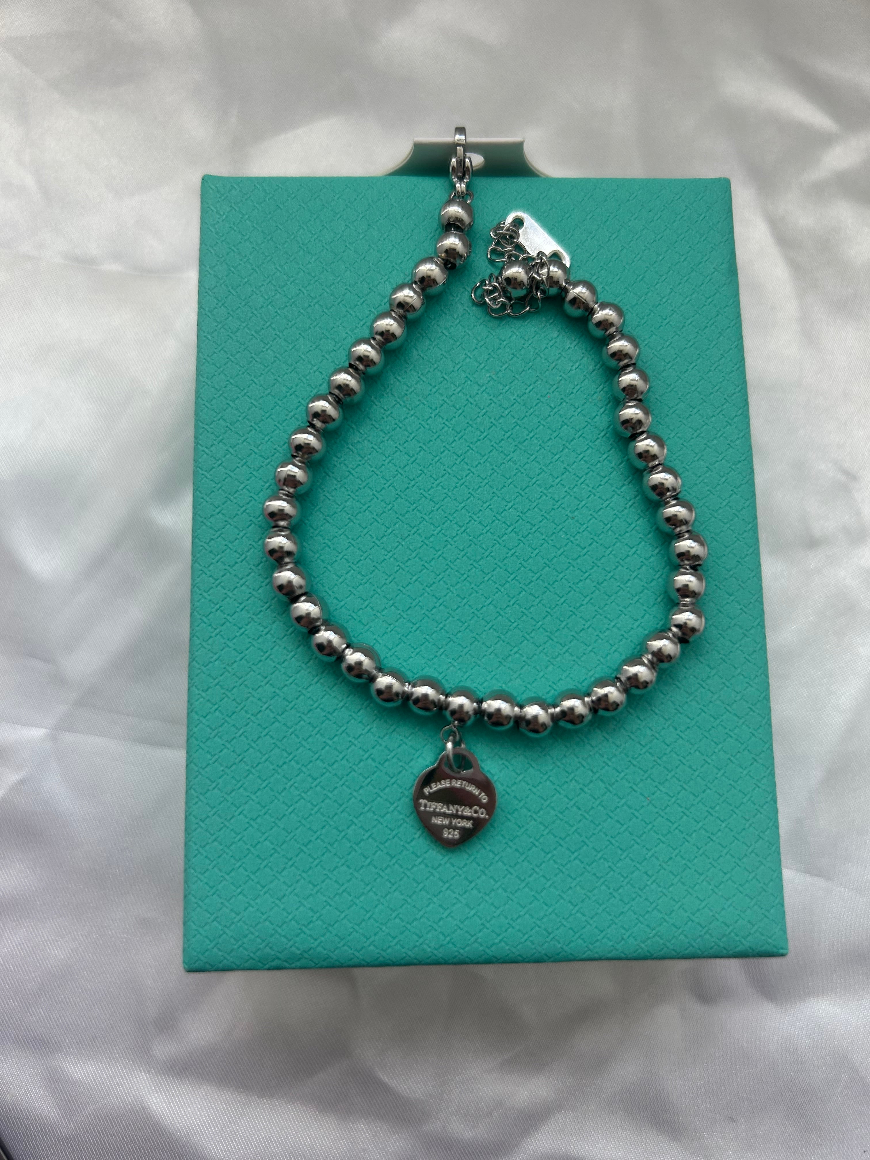 T New York Silver & Blue Heart Bracelet