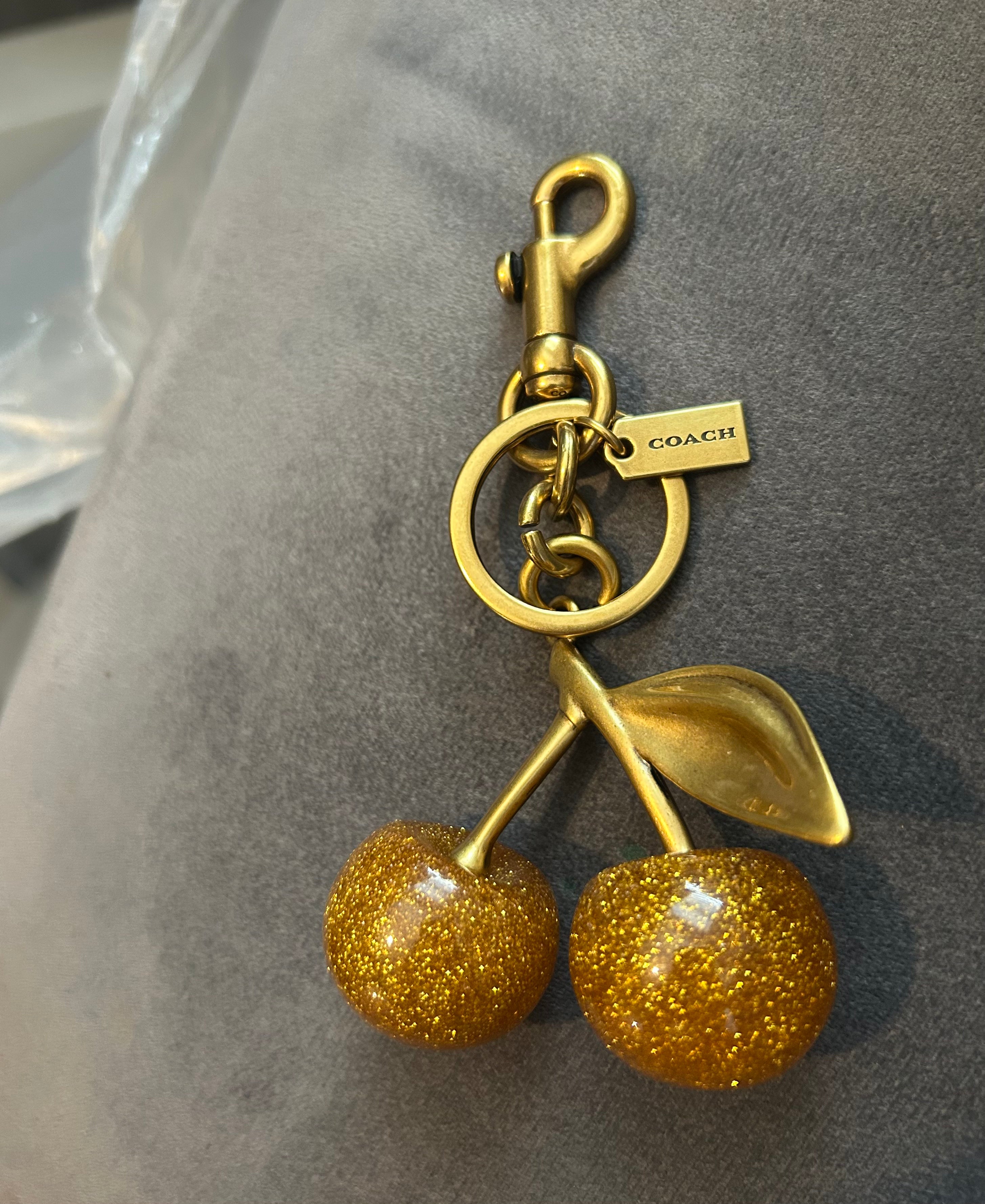 Coco golden cherries charm